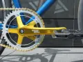 Złota korba Sturmey Archer i srebrna zębatka rowerowa, gotowe do wymiany.