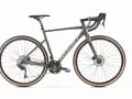 Zielony rower gravel z szerokimi oponami, idealny na każdą nawierzchnię. To jest właśnie gravel!