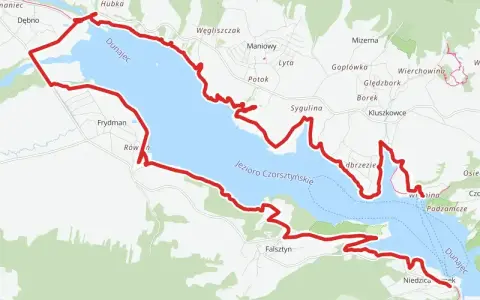 Trasa rowerowa velo dunajec wokół Jeziora Czorsztyńskiego, z widokiem na Dunajec i okoliczne miejscowości.