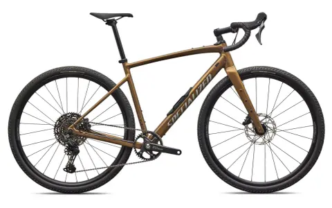 Brązowy rower gravelowy Specialized. Czy jego rama jest karbonowa czy aluminiowa?