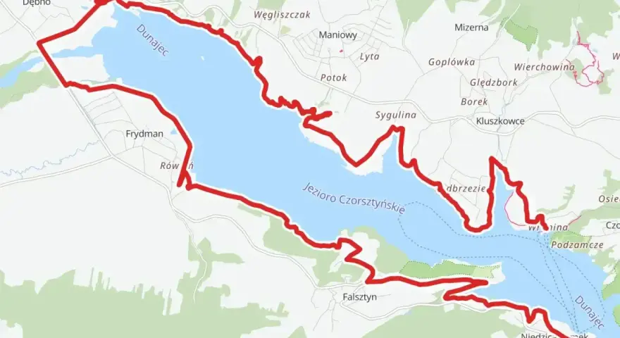 Trasa rowerowa velo dunajec wokół Jeziora Czorsztyńskiego, z widokiem na Dunajec i okoliczne miejscowości.