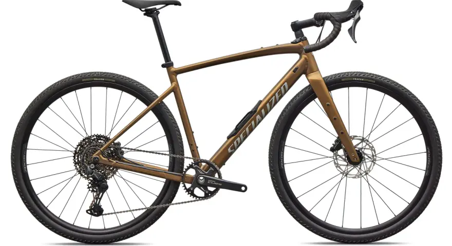 Brązowy rower gravelowy Specialized. Czy jego rama jest karbonowa czy aluminiowa?